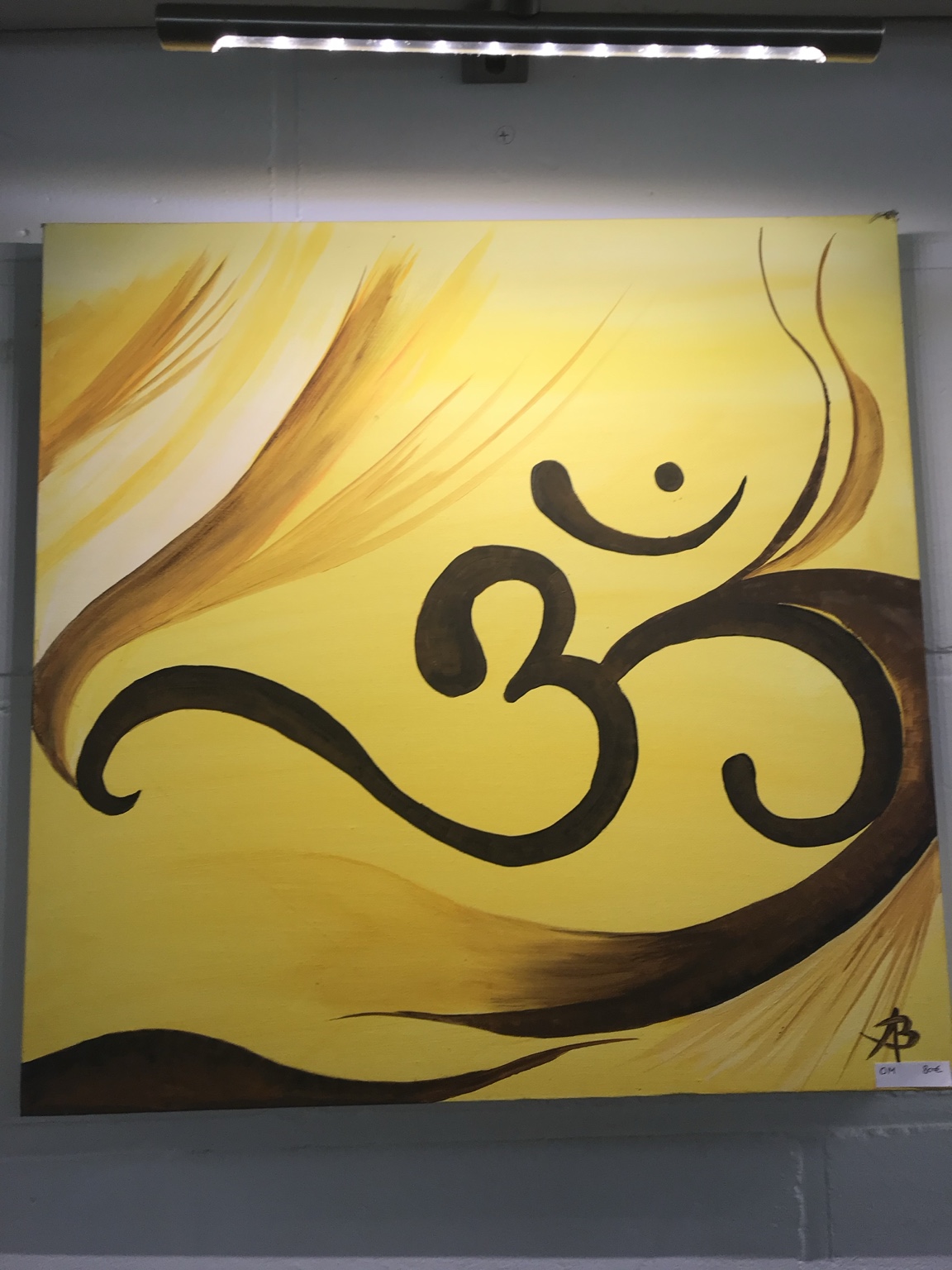 OM, peinture de Béa représentant le symbole OM sur un fond doré